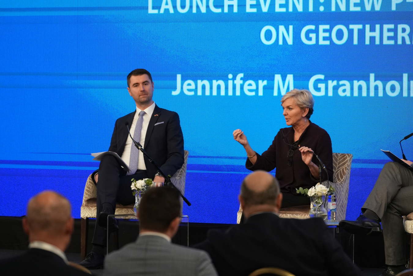 United Secretary of Energy Jennifer Granholm and Croatian Minister of Economy and Sustainable Development Davor Filipović sit in chairs on stage during a panel discussion at the Partnership for Transatlantic Energy and Climate Cooperation event.