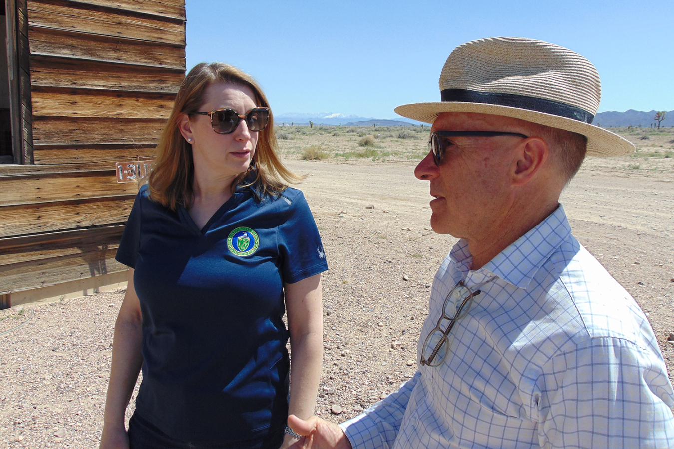 An outdoor photo of Corey Hinderstein and Dr. Robert Floyd.