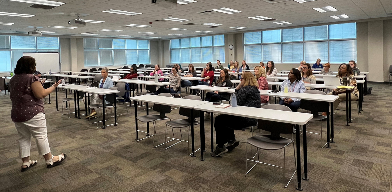 Industrial Safety Representative Miranda Kennedy discusses mental health awareness at a recent Women's Employee Resource Group meeting, part of a broader effort by the contractor to encourage discussion about mental wellness.