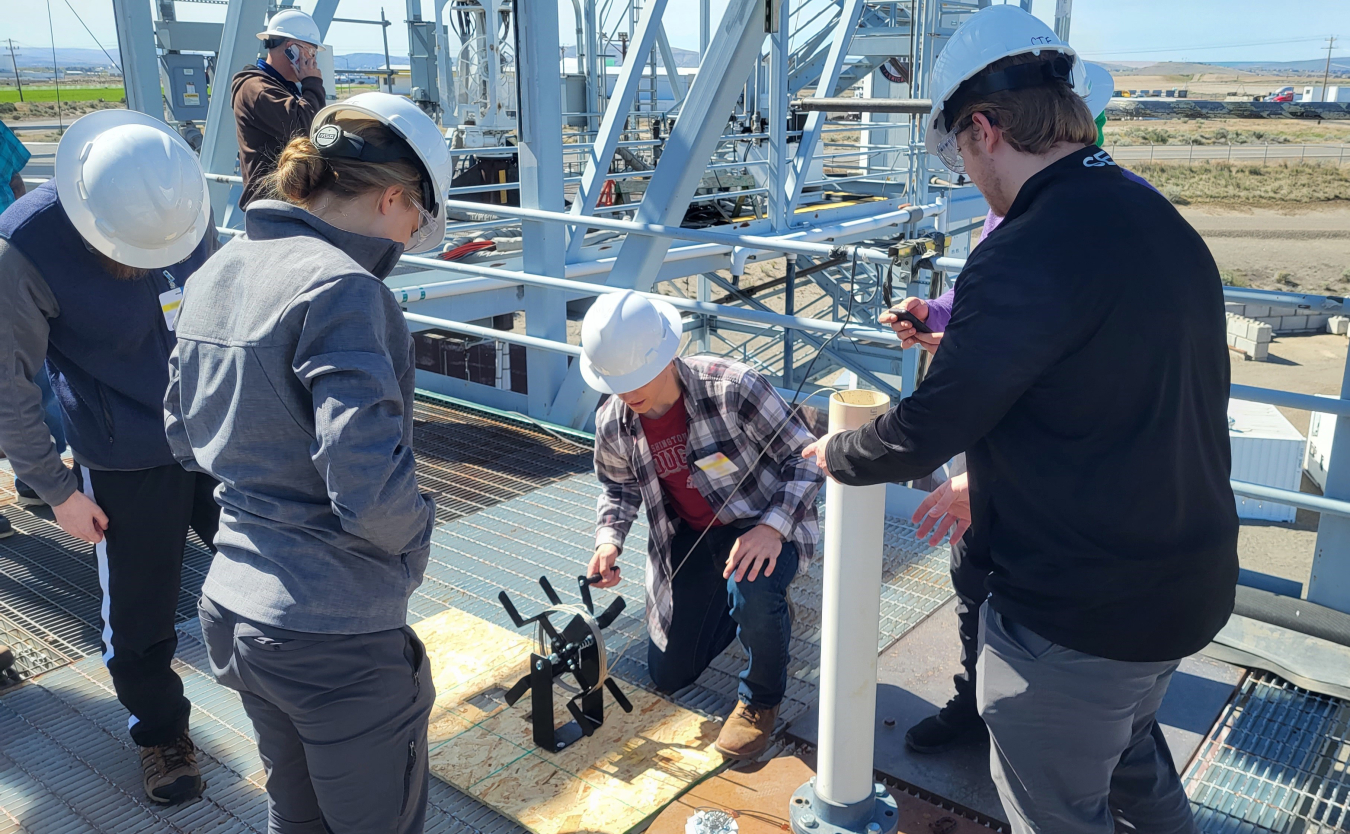 Washington State University students test their tank-waste crust sampling devices at the Hanford Site’s Cold Test Facility as part of their senior projects.