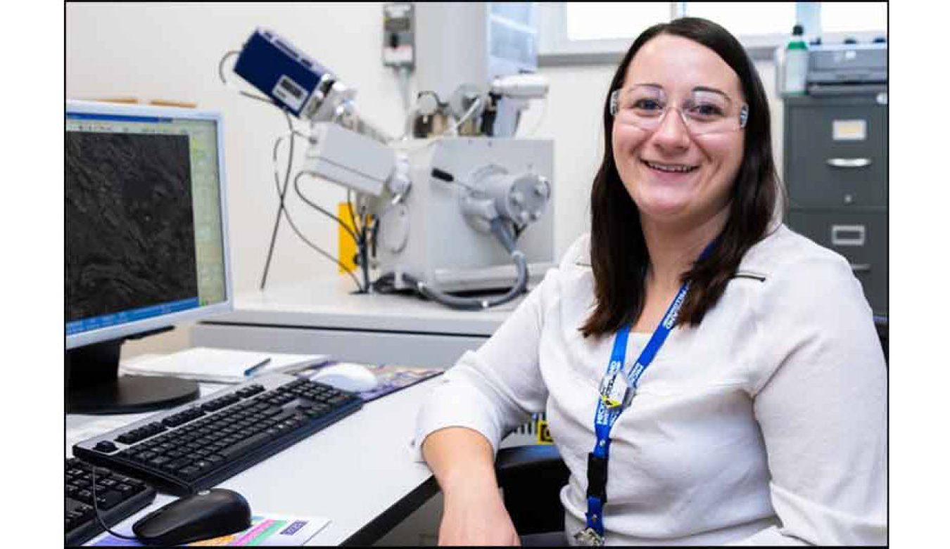 Photo of Amy Plechacek sitting at a desk