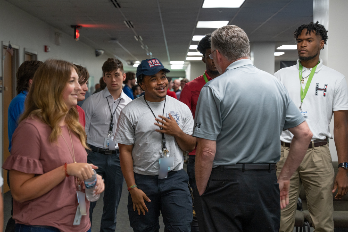 Savannah River Nuclear Solutions (SRNS) President and CEO Stuart MacVean talks with incoming interns during an internship program meet-and-greet that connected 180 participants in the program with SRNS senior executives and managers.