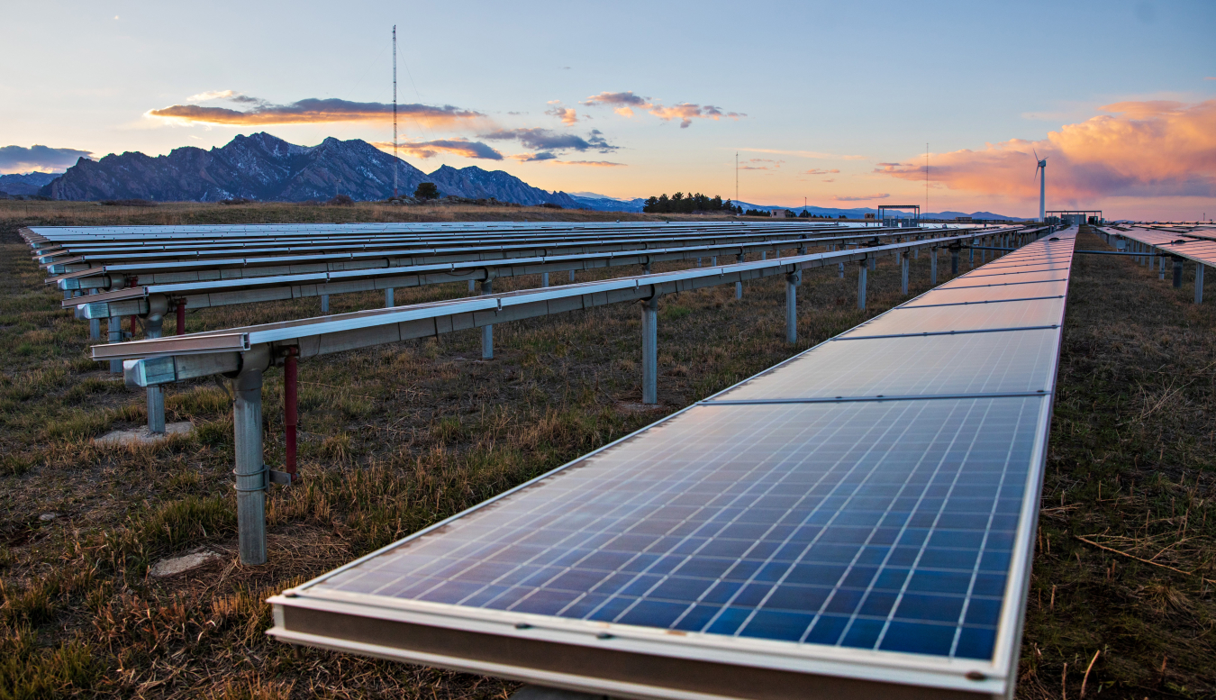 The sun sets upon the Flatirons Campus (FC) of the National Renewable Energy Laboratory (NREL), and the 1MW photovoltaics array.