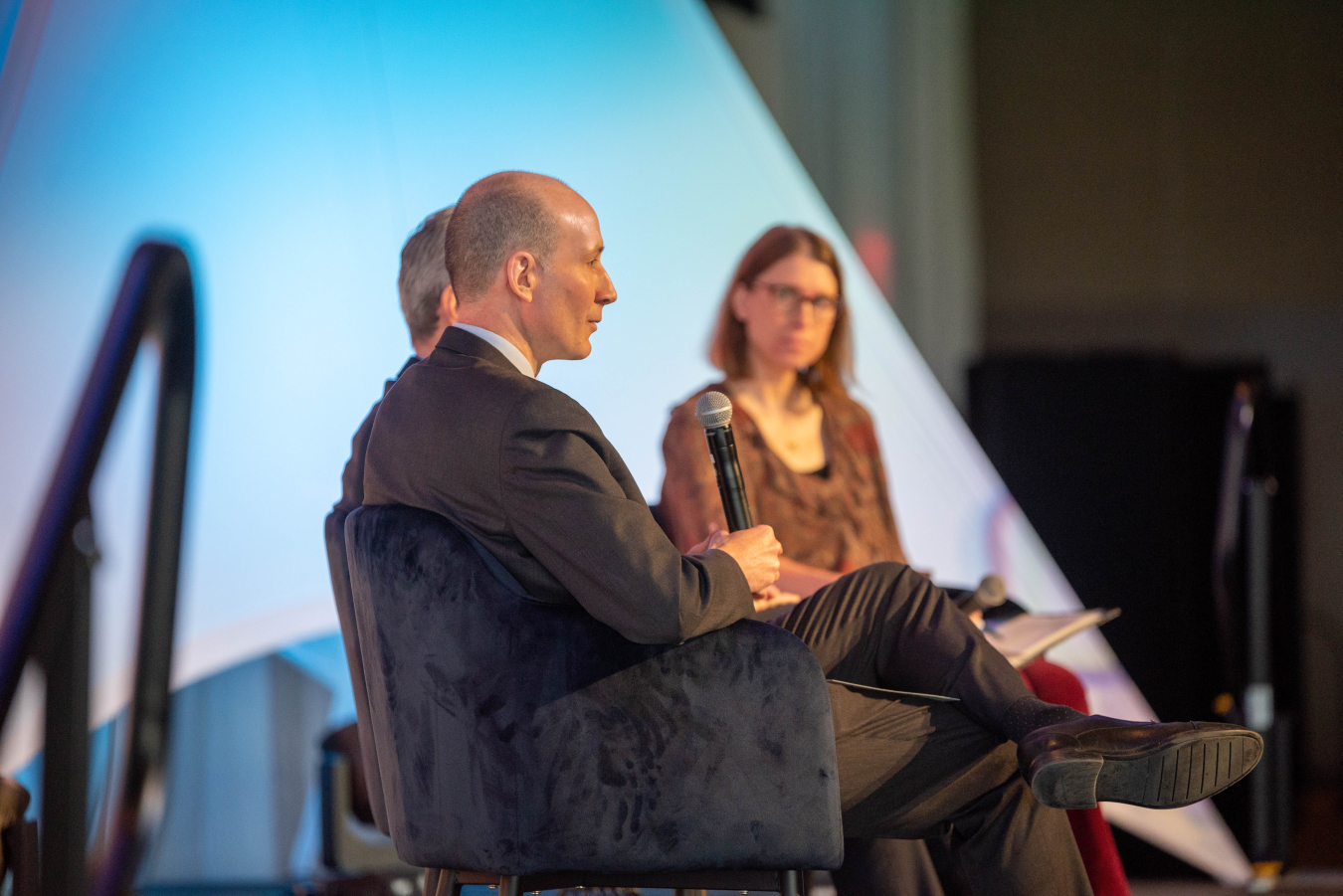 Deputy Secretary Turk in conversation with Arctic Energy Office's Director Erin Whitney at the Alaska Sustainable Energy Conference on May 23, 2023.