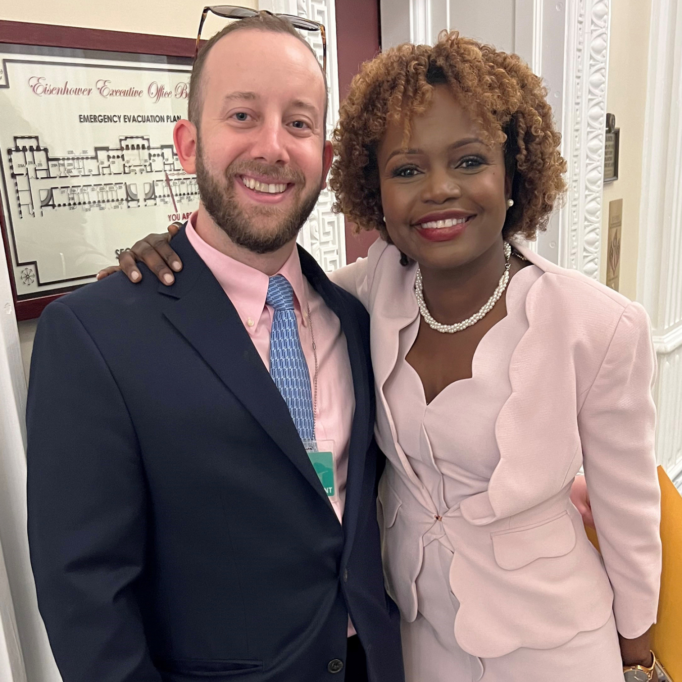 Jesse Altum and Karine Jean Pierre posing for a photo at the White House.