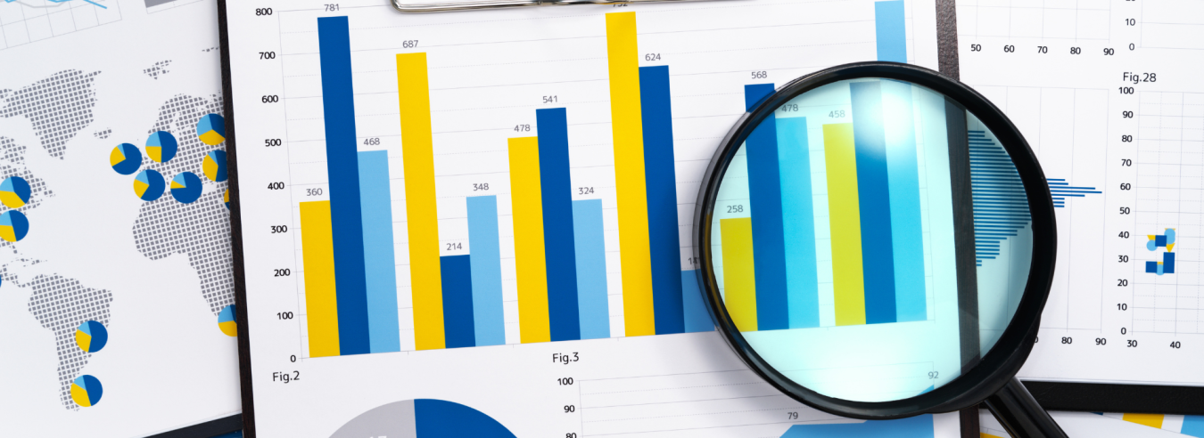 Bar graph and magnifying glass