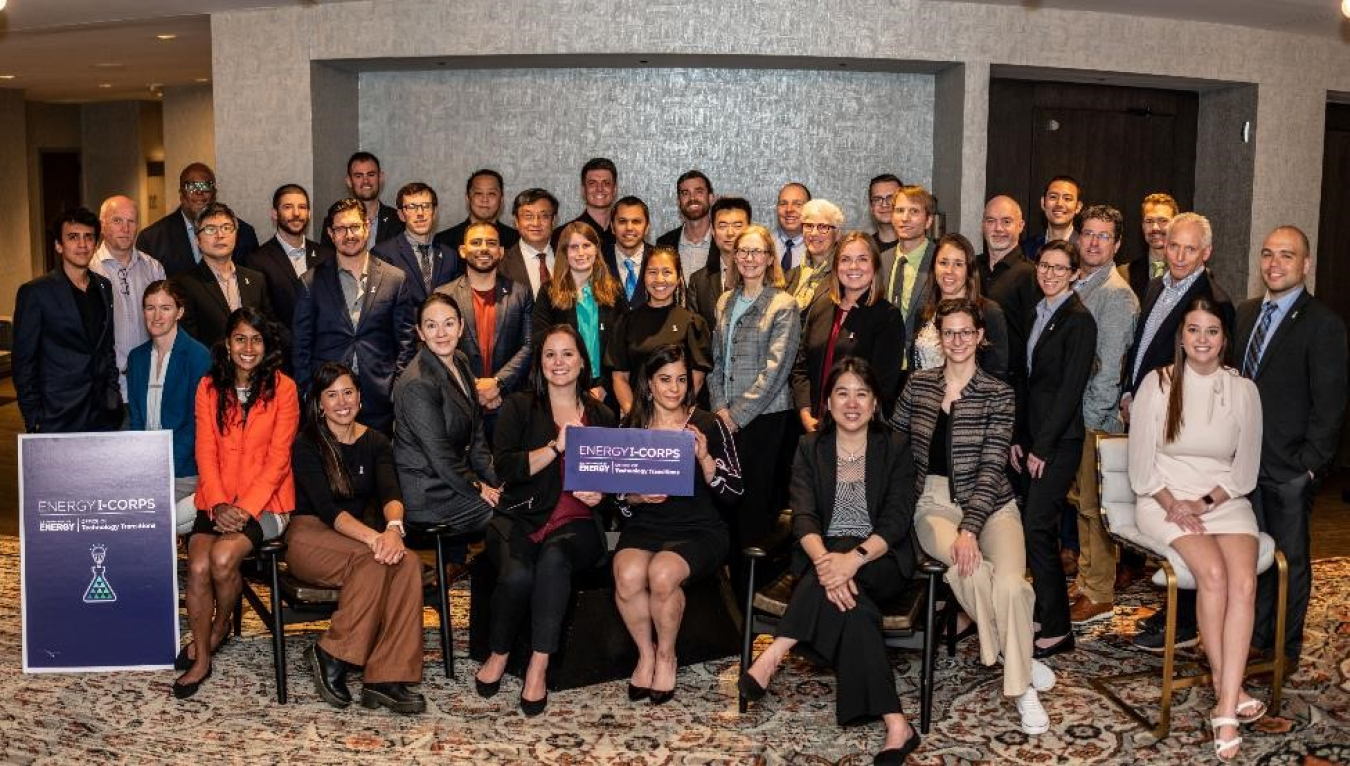 DOE Chief Commercialization Officer and OTT Director Dr. Vanessa Chan stands with National Lab researchers at their Energy I-Corps graduation ceremony in May 2023. 