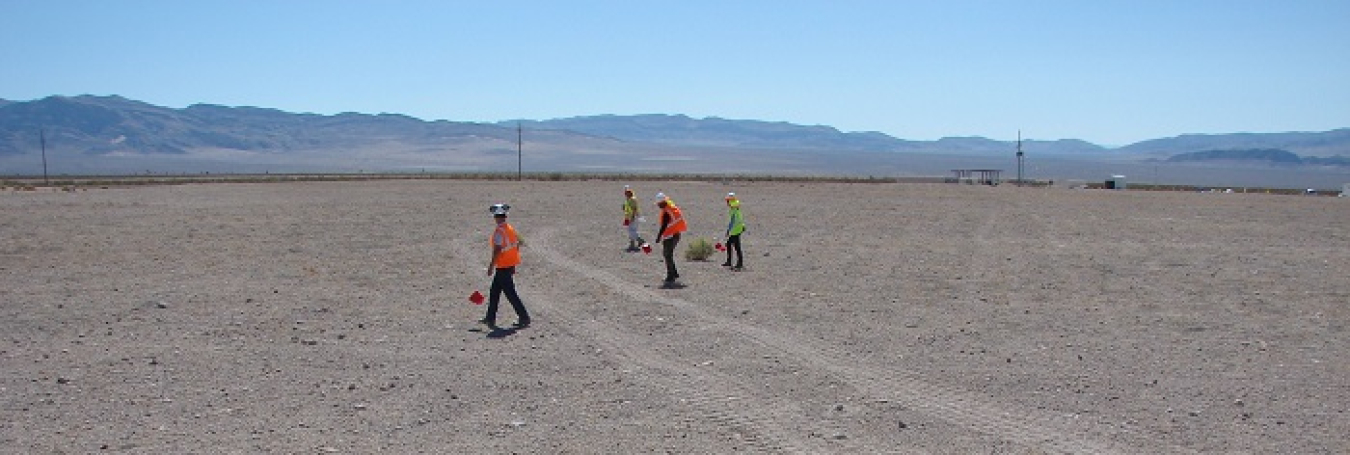 A look at flags being placed as part of the walk-down process. EM Nevada Program team members perform this visual inspection to ensure compliance with regulatory commitments.