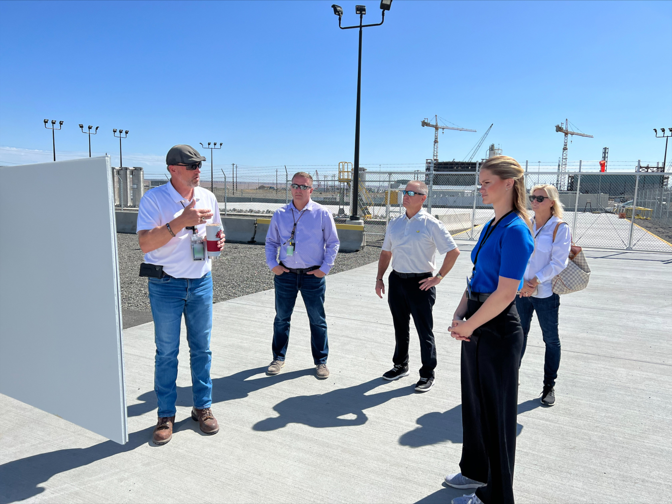 Miss America 2023 Grace Stanke, at right-front, learned about the Hanford Site’s Tank-Side Cesium Removal System during a briefing from Washington River Protection Solutions Production Operations Deputy Manager Ted Jarecki, at left. Stanke, a nuclear engineering student at the University of Wisconsin-Madison, was at the site to participate in the Hanford Women in Engineering speaker series.