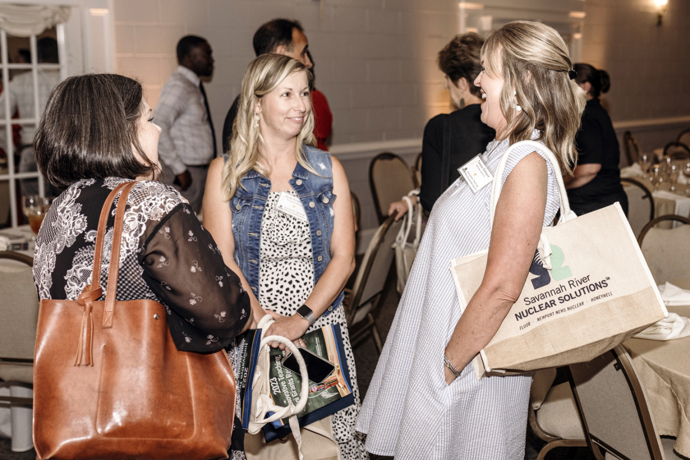 Merriwether Elementary School teacher Teressa Gillespie, right, talks with teachers Kim Ketusky, left, with First Baptist Church Education, and Sarah Kirkendohl, center, with Merriweather Elementary, after Gillespie received a $750 grant from Savannah River Nuclear Solutions (SRNS). To date, SRNS has awarded $900,000 in grants to support educators in the region. Merriwether Elementary is located in North Augusta, South Carolina, and First Baptist is in Augusta, Georgia.