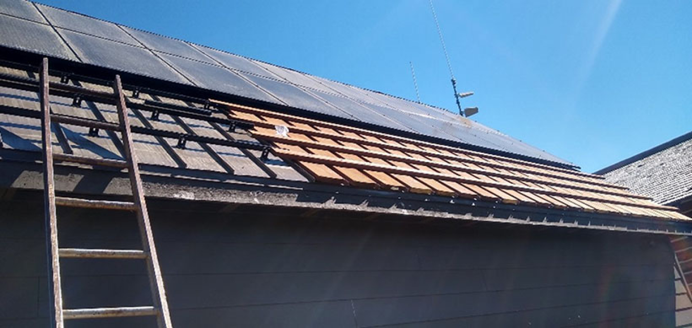 Photo of a roof with PV panels.