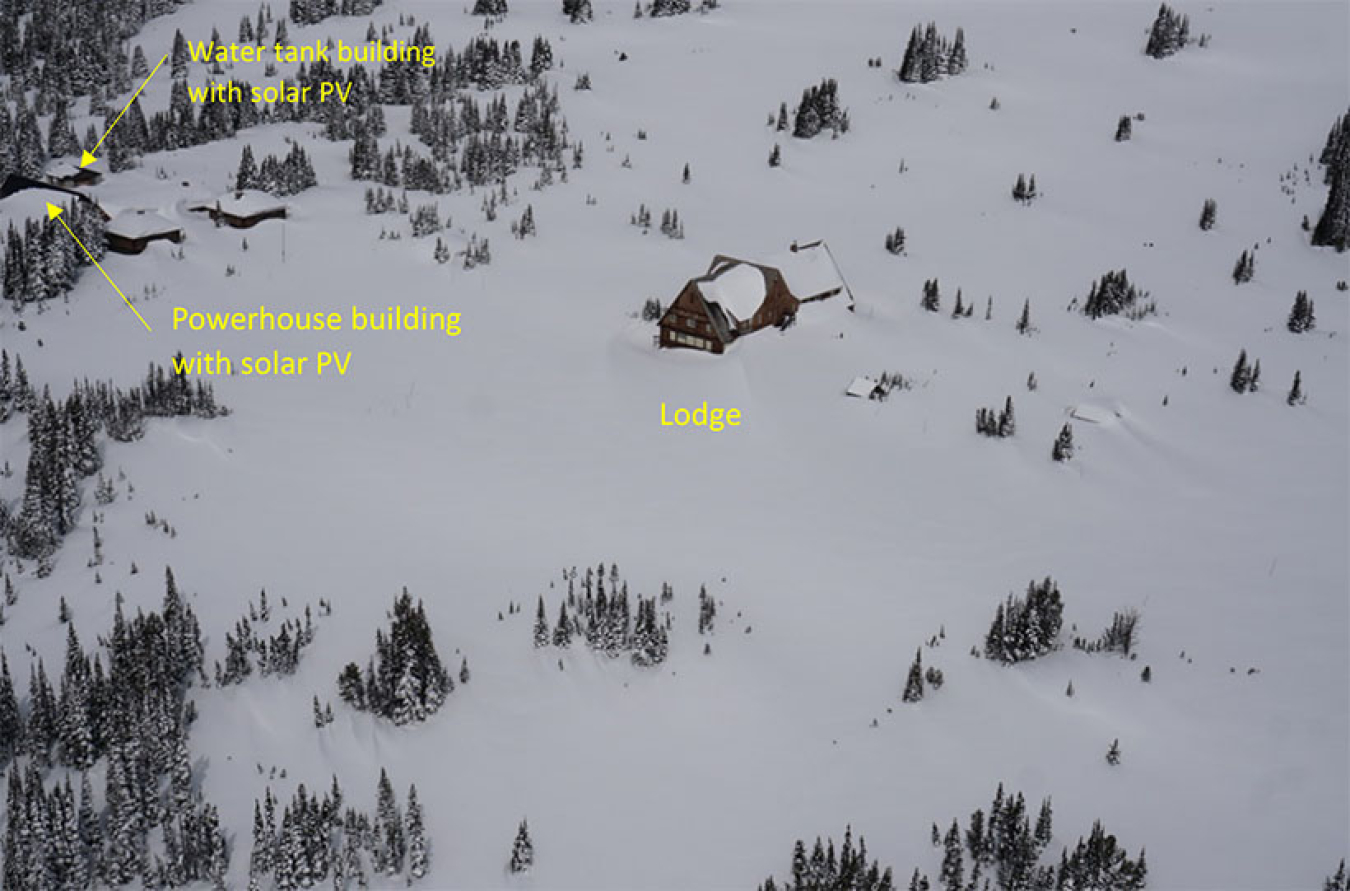 Aerial photo of Sunrise park with arrows showing the location of the water tank, powerhouse building, and lodge.