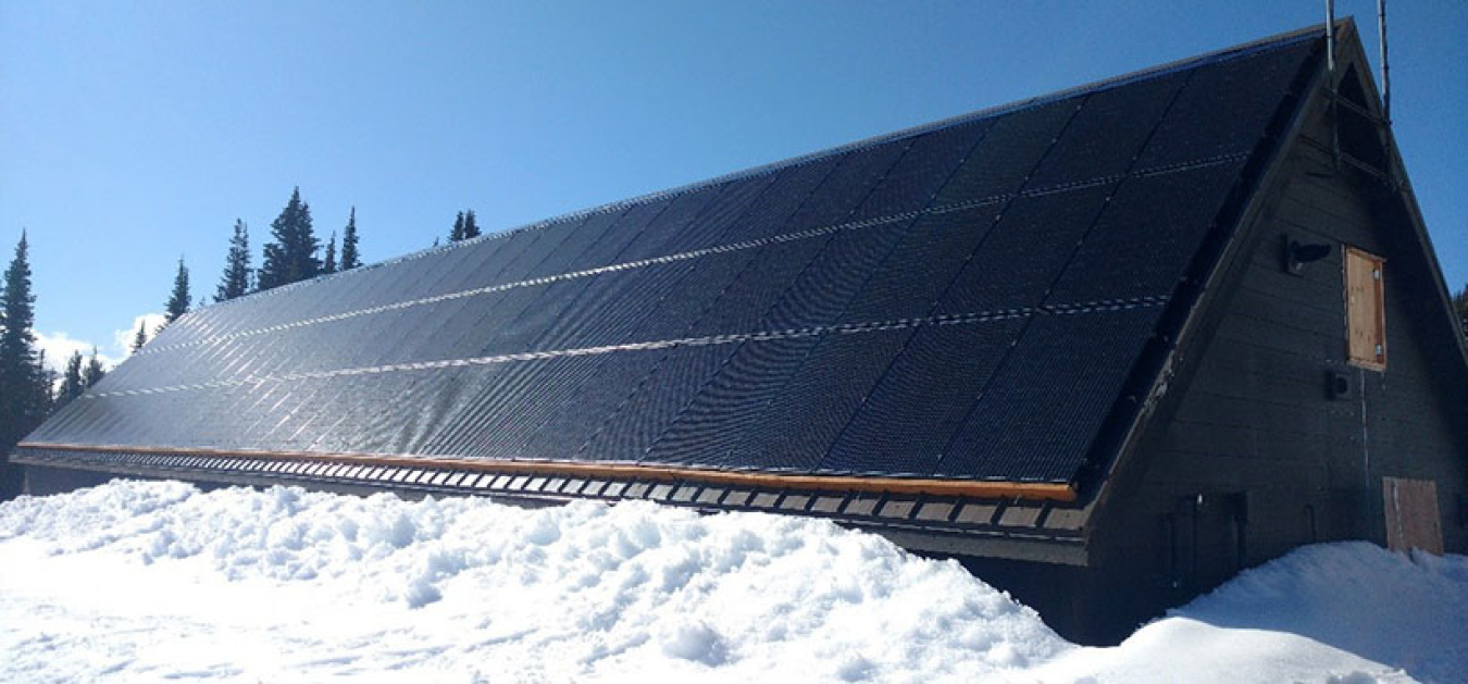 Photo of the powerhouse building's roof covered in PV panels.