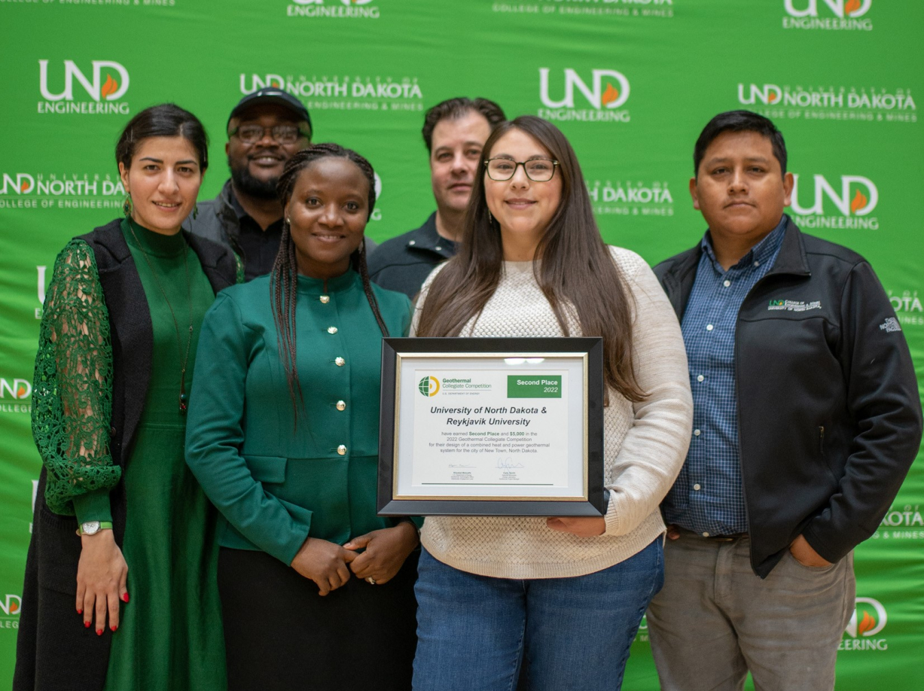 The 2022 Geothermal Collegiate Competition second-place winning team University of North Dakota and Reykjavik University poses with their award