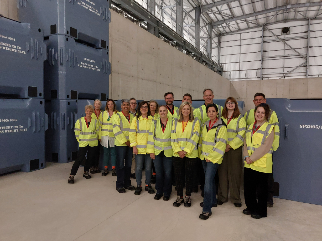 The delegations from the United States, United Kingdom and Canada are pictured inside the U.K. Nuclear Decommissioning Authority Sellafield Interim Storage Facility, which is vital to the U.K. waste retrieval mission.