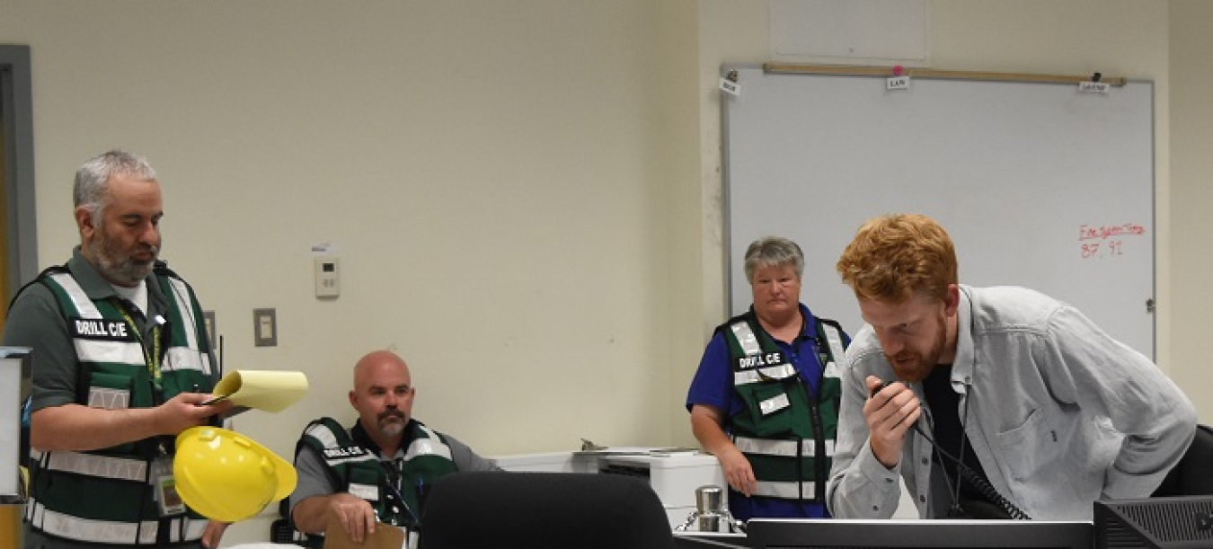 Evaluators observe Devin Lockard, right, Waste Treatment and Immobilization Plant Control Room supervisor, as he leads his team through an operations drill inside Hanford’s Low-Activity Waste Facility.