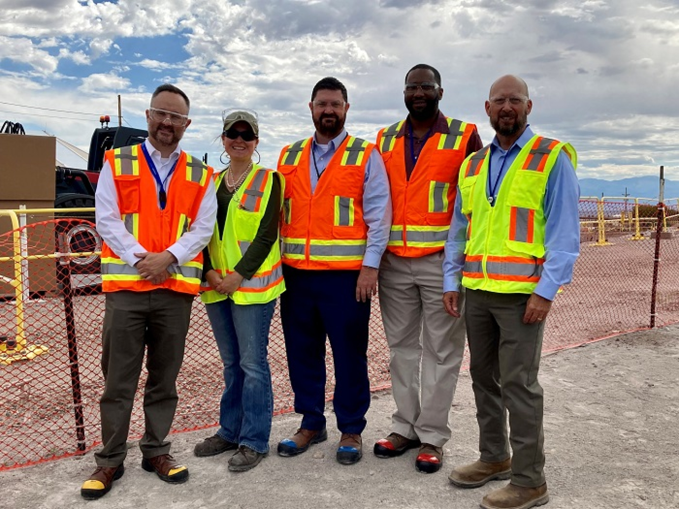 During a recent visit to the EM Los Alamos site, EM Principal Deputy Assistant Secretary Jeff Avery observed the excavation pit for corrugated metal pipe retrievals at Technical Area 54, Area G. From left: John Howard, EM deputy chief of staff; Ellie Gilbertson, deputy manager, EM Los Alamos Field Office; Avery; Aaron White, director, EM Office of Regulatory Compliance; and Brad Smith, president and general manager, Newport News Nuclear BWXT Los Alamos.