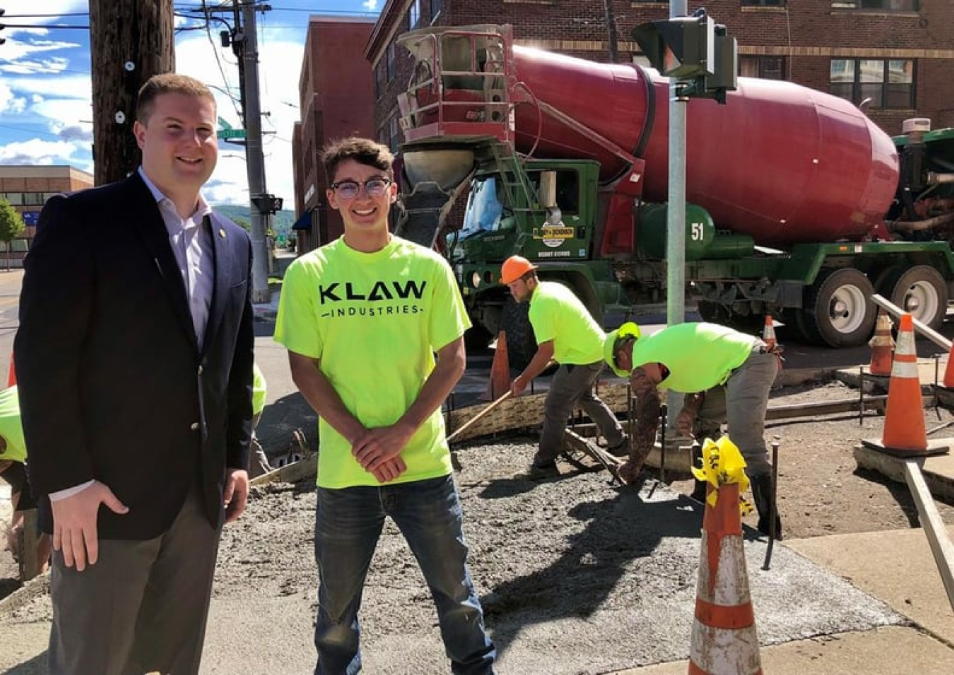 City of Binghamton Mayor Jared Kraham with KLAW Industries COO, Jacob Kumpon, on Court Street, where new high-performance, low-carbon curb and sidewalks are being poured in New York.