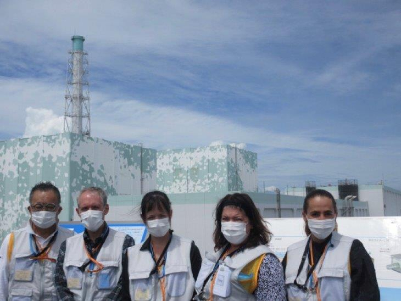 Pictured at the Fukushima Daiichi NPS during a tour, from left are Masaki Nakagawa, special adviser to executive directors, NDF; Ike White, EM senior advisor; Kristen Ellis, acting associate principal deputy assistant secretary for the Office of Regulatory and Policy Affairs and director of Regulatory, Intergovernmental, and Stakeholder Engagement; Cathy Tullis, chief of staff; and Karen Edson, public affairs specialist.