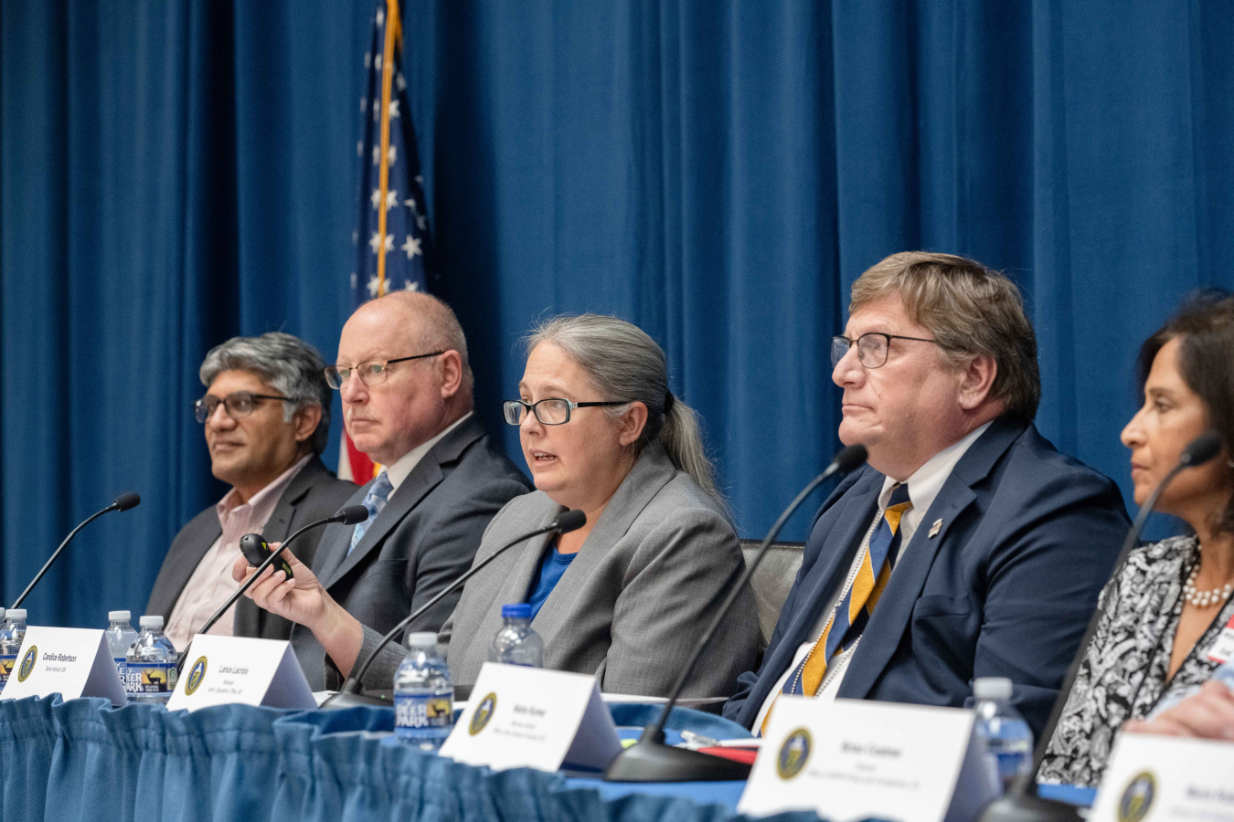 Candice Robertson, center, EM advisor to the "Cleanup to Clean Energy" initiative, serves on a panel as part of "Cleanup to Clean Energy" Industry Day on July 28.