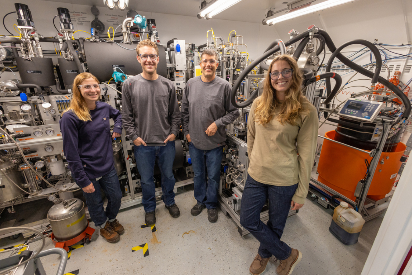 Companies use NREL’s FTLB capabilities to validate advanced refining processes, including Alder Renewables’ distillation skid (pictured here with a team of NREL and Alder Renewables researchers) used to pilot an integrated process for turning biomass into bio-oils that can be converted into SAF.