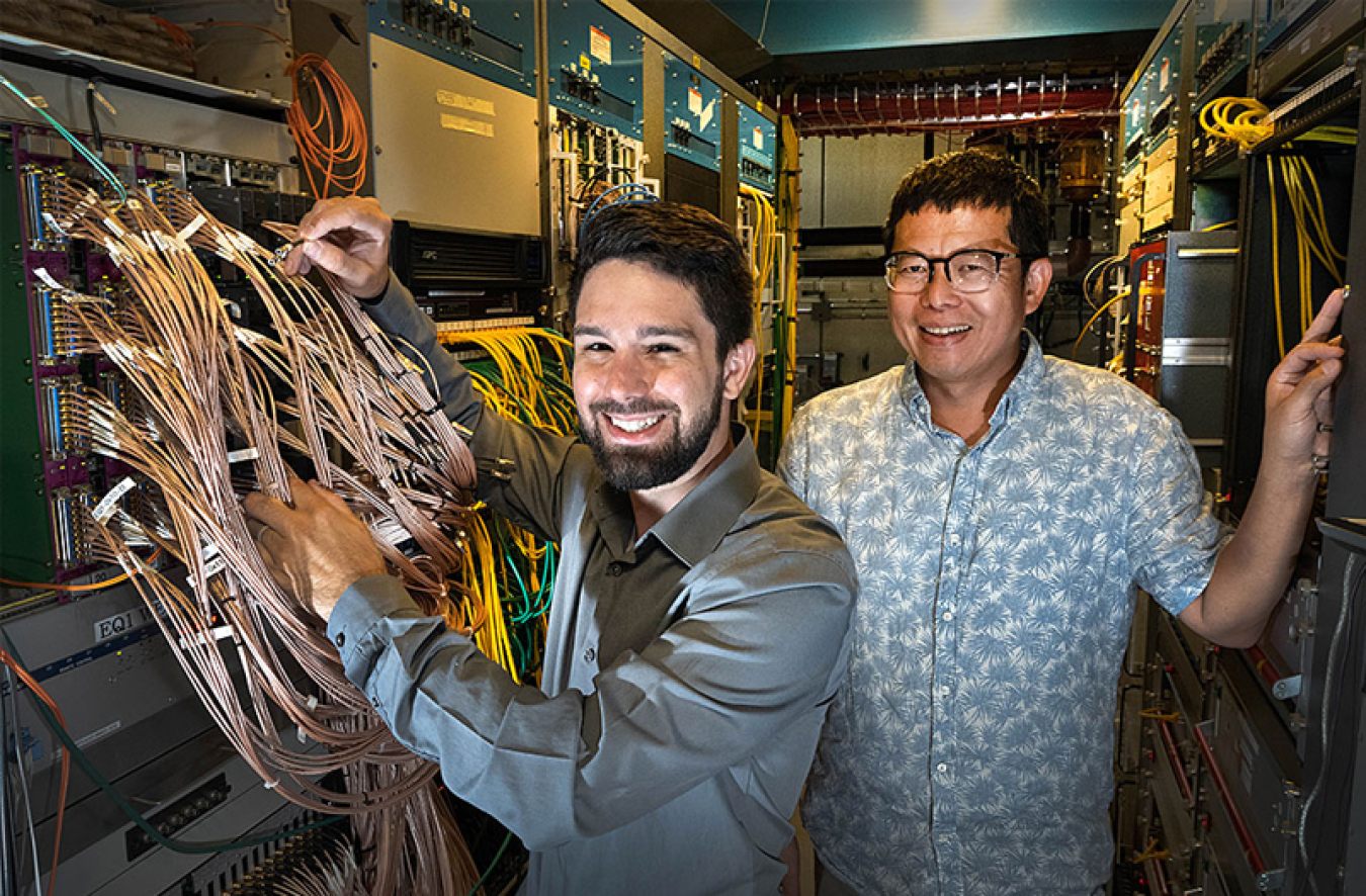 Daniel Brandenburg and Zhangbu Xu at the STAR detector of the Relativistic Heavy Ion Collider (RHIC).