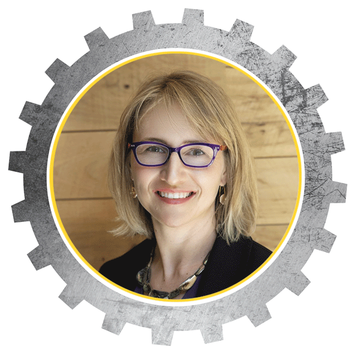 Headshot of a woman smiling inside a designed cog.