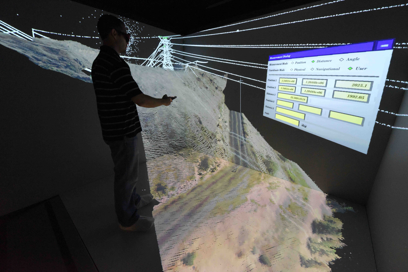 Jake Gentle conducts critical infrastructure analysis using General Line Ampacity State Solver (GLASS) software.