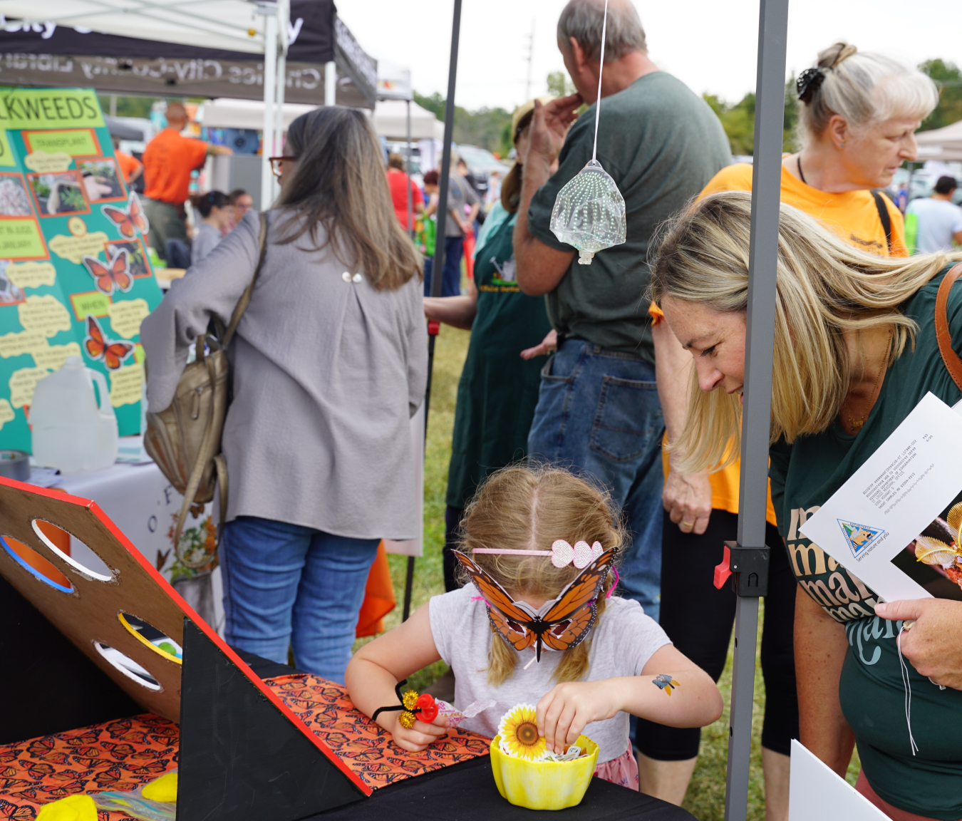 Festivalgoers immersed themselves in a world of creativity and learning, exploring a diverse range of exhibits and interactive displays, including the vibrant O'Fallon Garden Club.