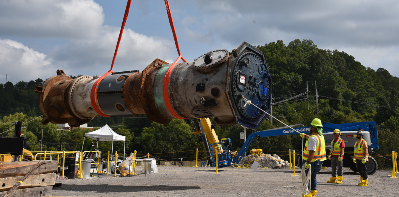 Test Reactor being lifted into the air for removal 