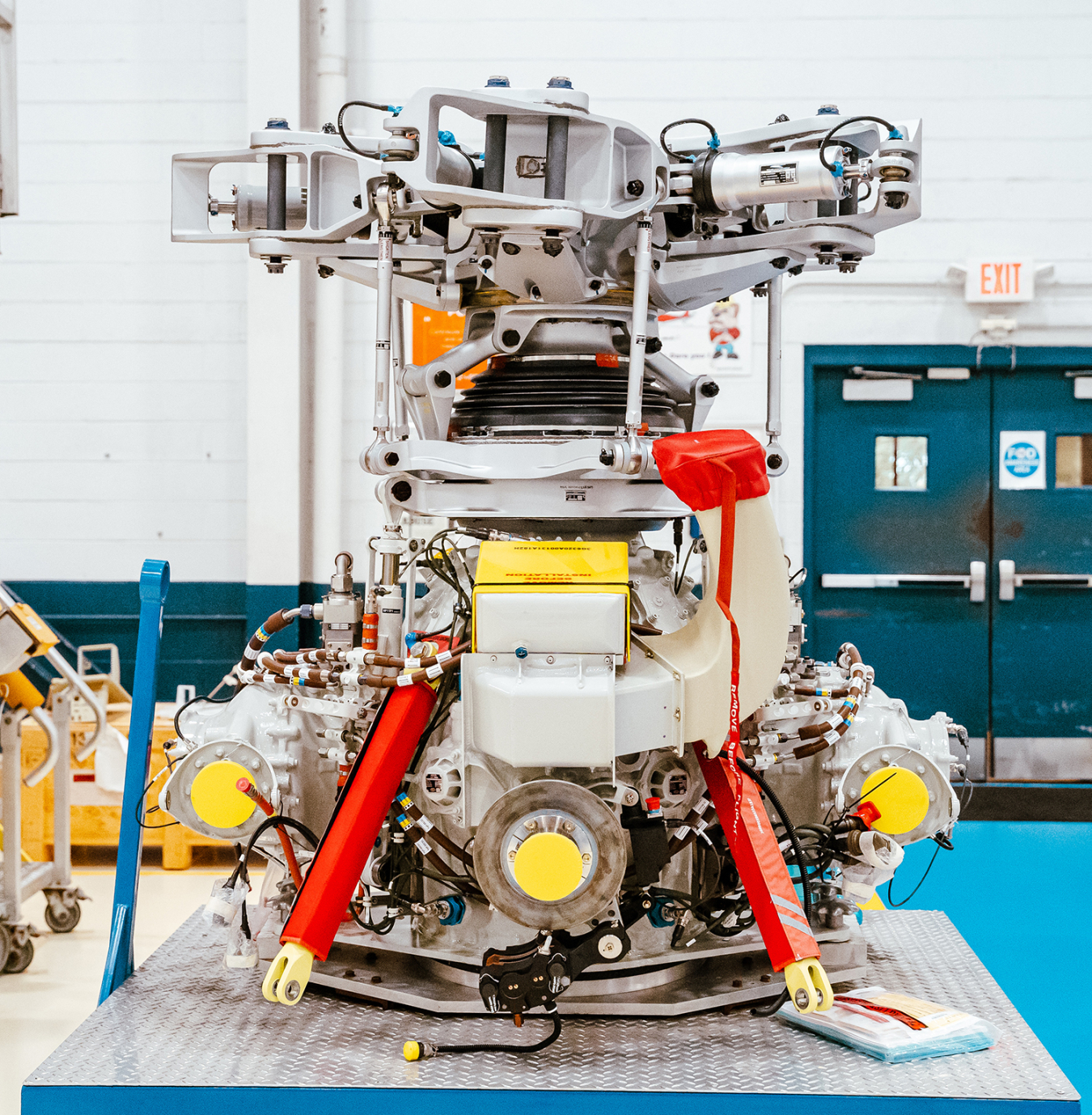 A machine sits on a metal platform.