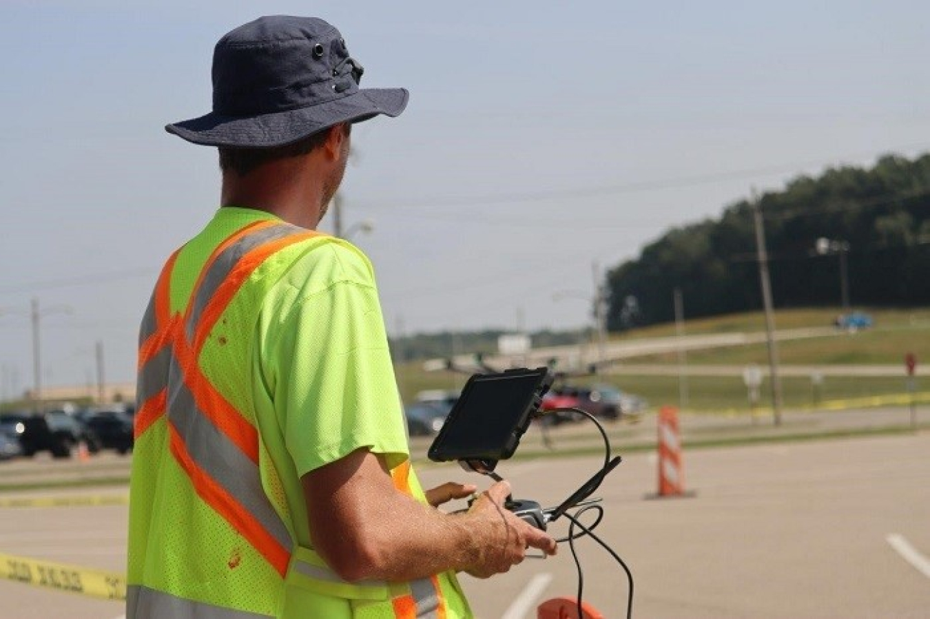 Ohio Department of Transportation Unmanned Aircraft System Data Manager Jamie Davis operates a drone at the Portsmouth Site in a test effort to collect data for potential future use by the state of Ohio and EM.