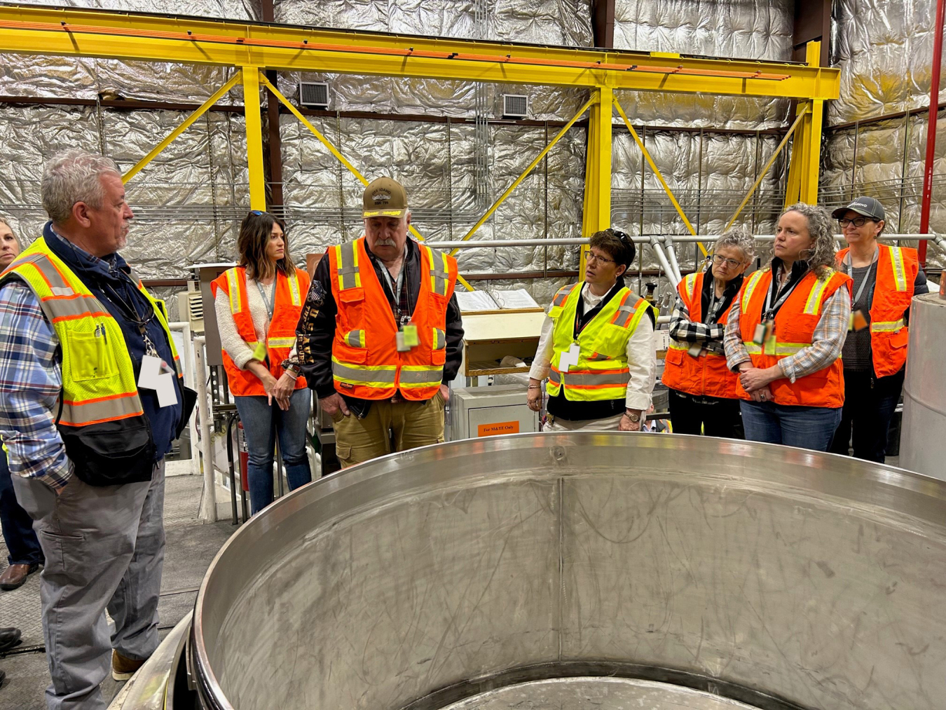 several people wearing safety vests