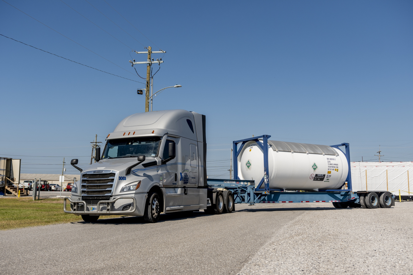 A large gray tractor-trailer truck