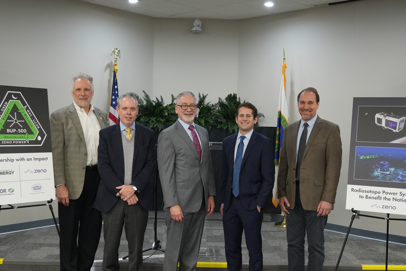 Representatives from DOE, Zeno Power, DOD, and NASA celebrate a new partnership