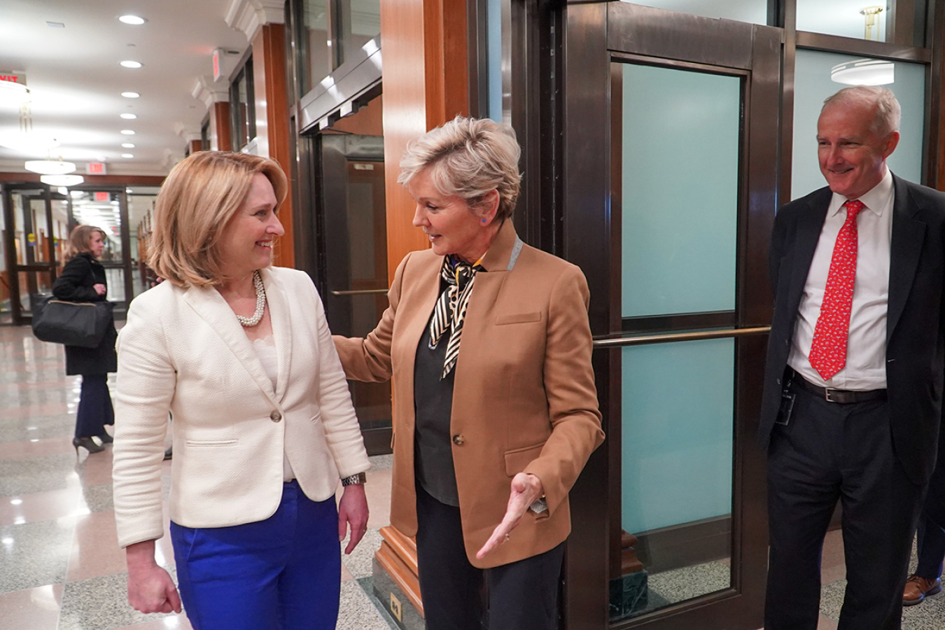 U.S. Secretary of Energy Jennifer Granholm greets Deputy Secretary of Defense Kathleen Hicks.