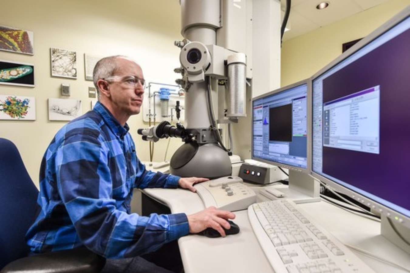 a photo of a researcher working on a computer