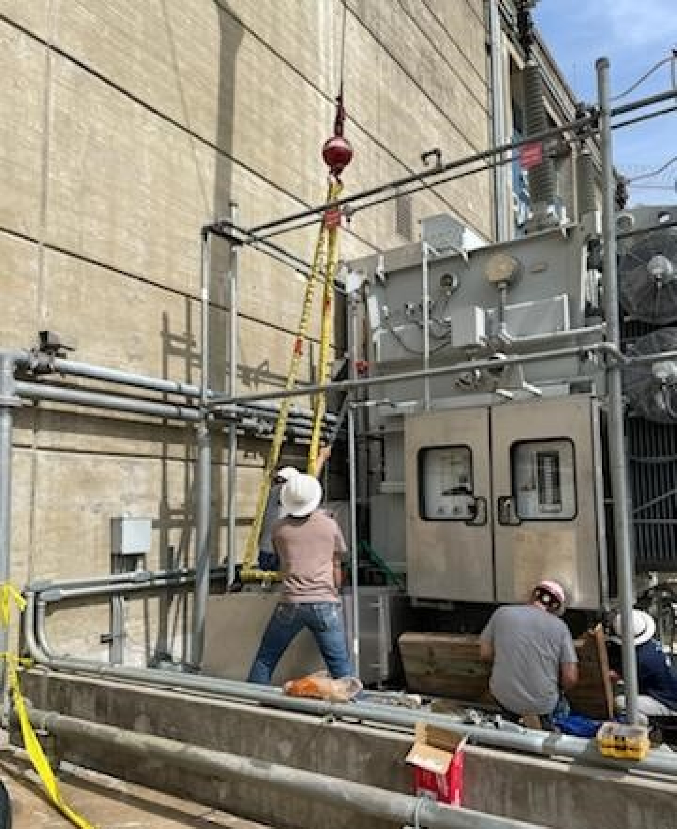 SWPA and Corps crews working to repair the cabinet.