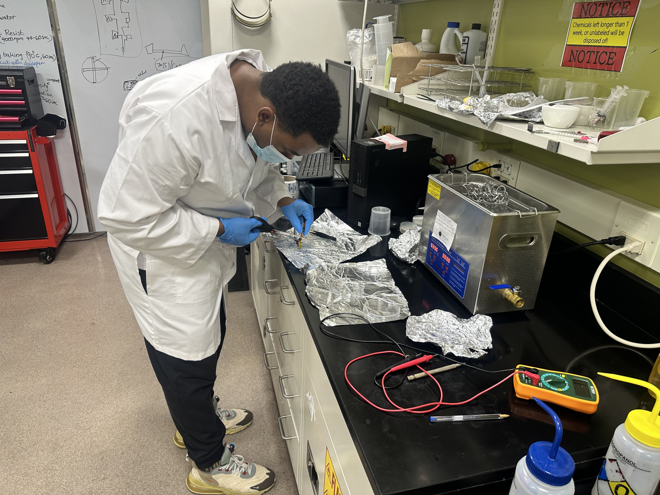 Tewelde Semere working in a lab