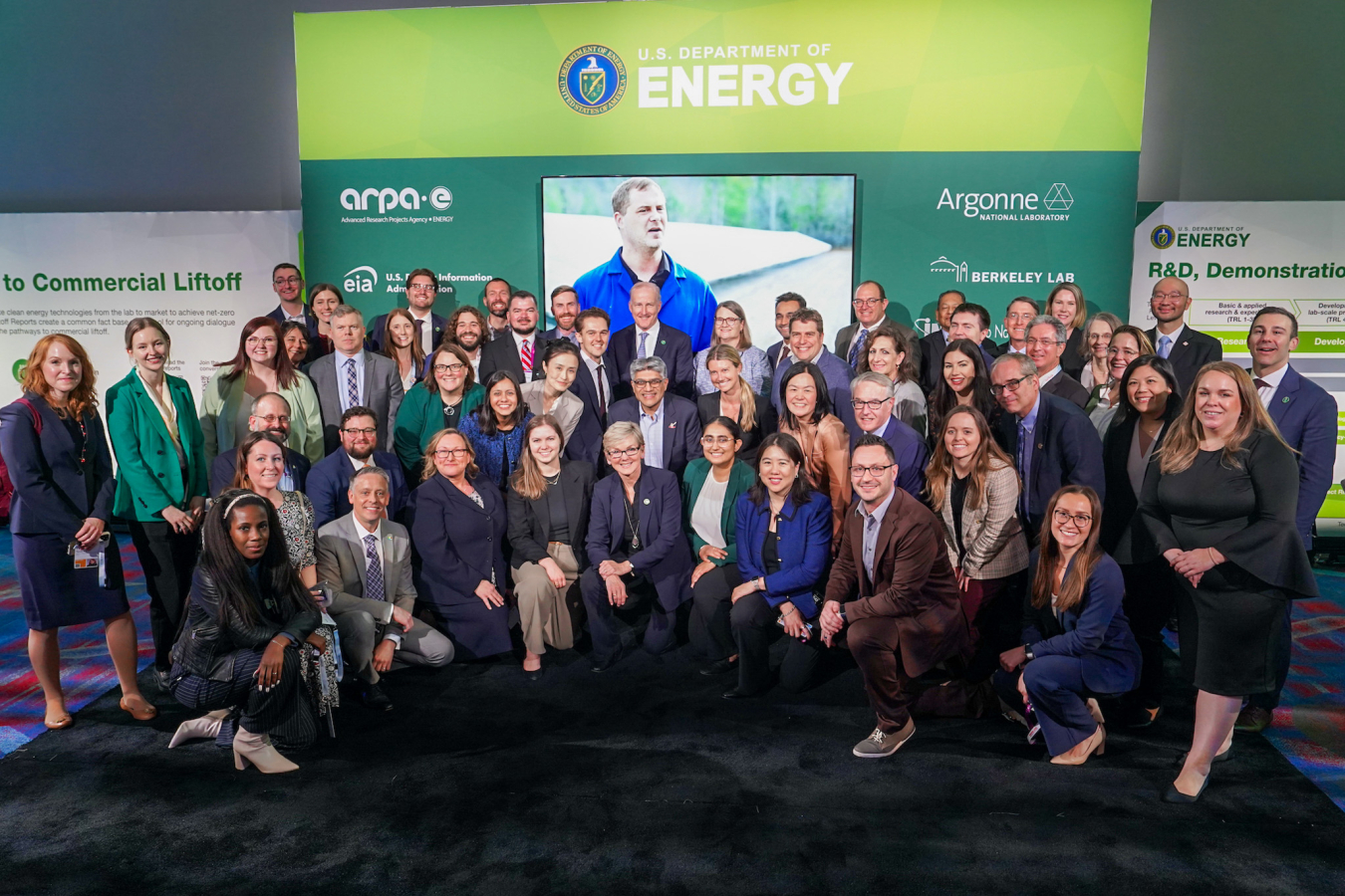 Secretary Jennifer Granholm poses for a group pictures with member of the U.S. Department of Energy at CERAWeek 2024 in Houston, Texas.