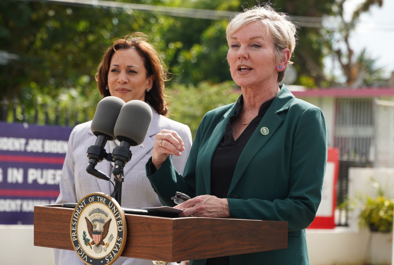 U.S. Energy Secretary Jennifer Granholm delivers remarks outside of the Ramos home in Canóvanas, Puerto Rico.  Also pictured:  Vice President Kamala Harris