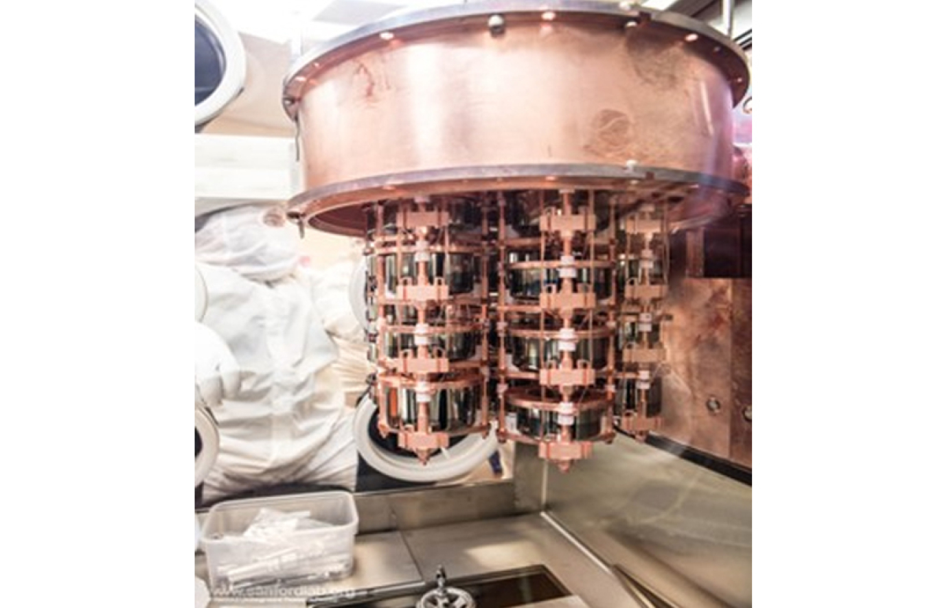 Final assembly of germanium radiation detectors for the Majorana Demonstrator in 2015. These detectors produced a low-background, “quiet” data set that researchers used to search for signs of dark matter and other physics beyond the Standard Model.