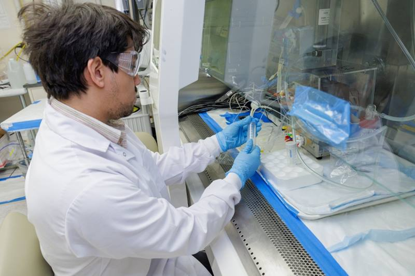 Student working in the Texas A&M University lab processing astatine-211.