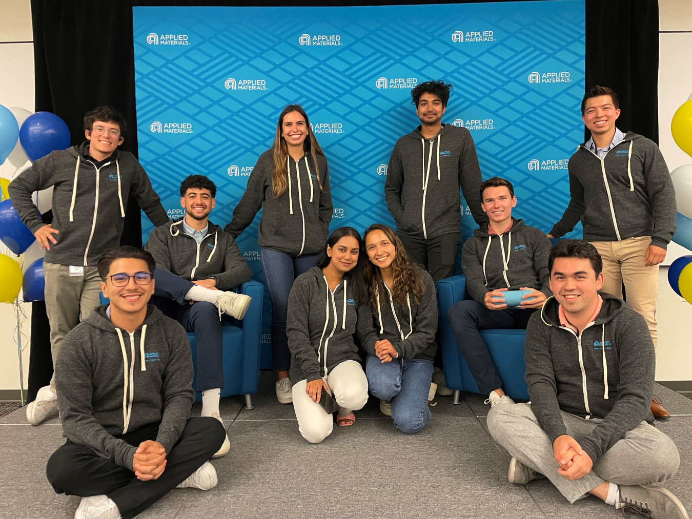 Francisco Aguirre posing with other summer interns in matching sweatshirts