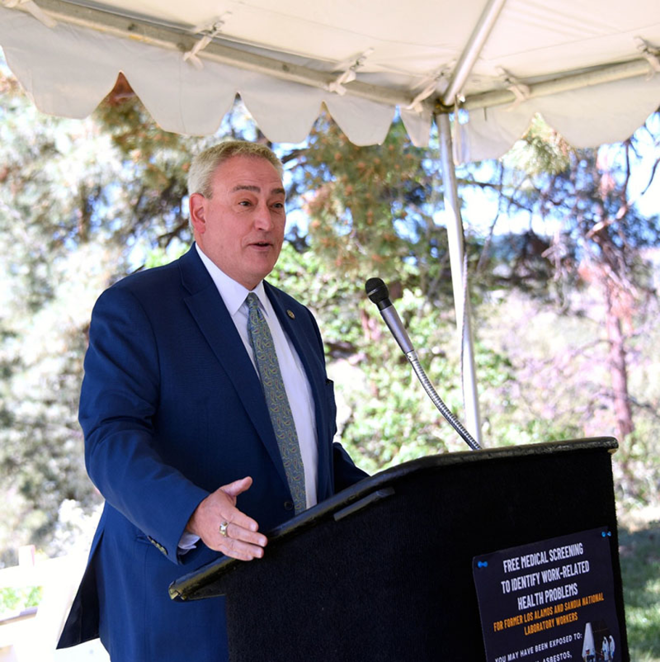 Mr. Todd Lapointe, Director, Office of Environment, Health , Safety and Security (or EHSS) speaks at the podium to the audience.