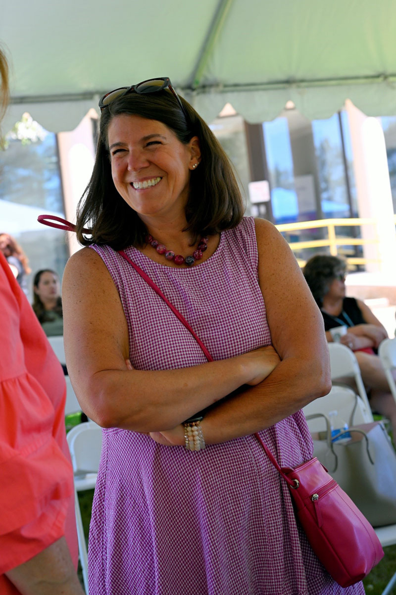 Sara Pasqualoni MD MPH,  LANL Site Occupational Medical Director, Division Leader Occupational Health laughs while mingling after the conclusion of presentations.