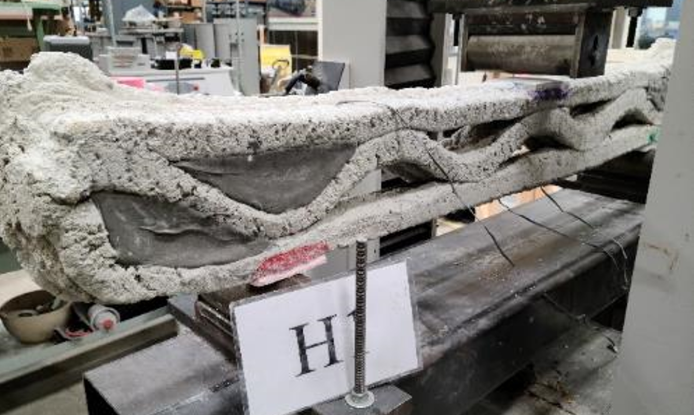 Structural testing of 3D-printed concrete wall section.