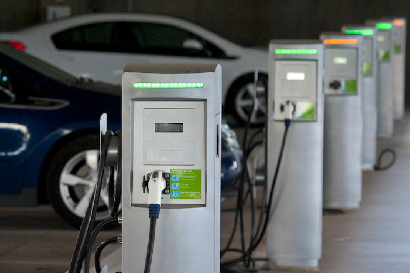 A line of electric vehicle charging stations.