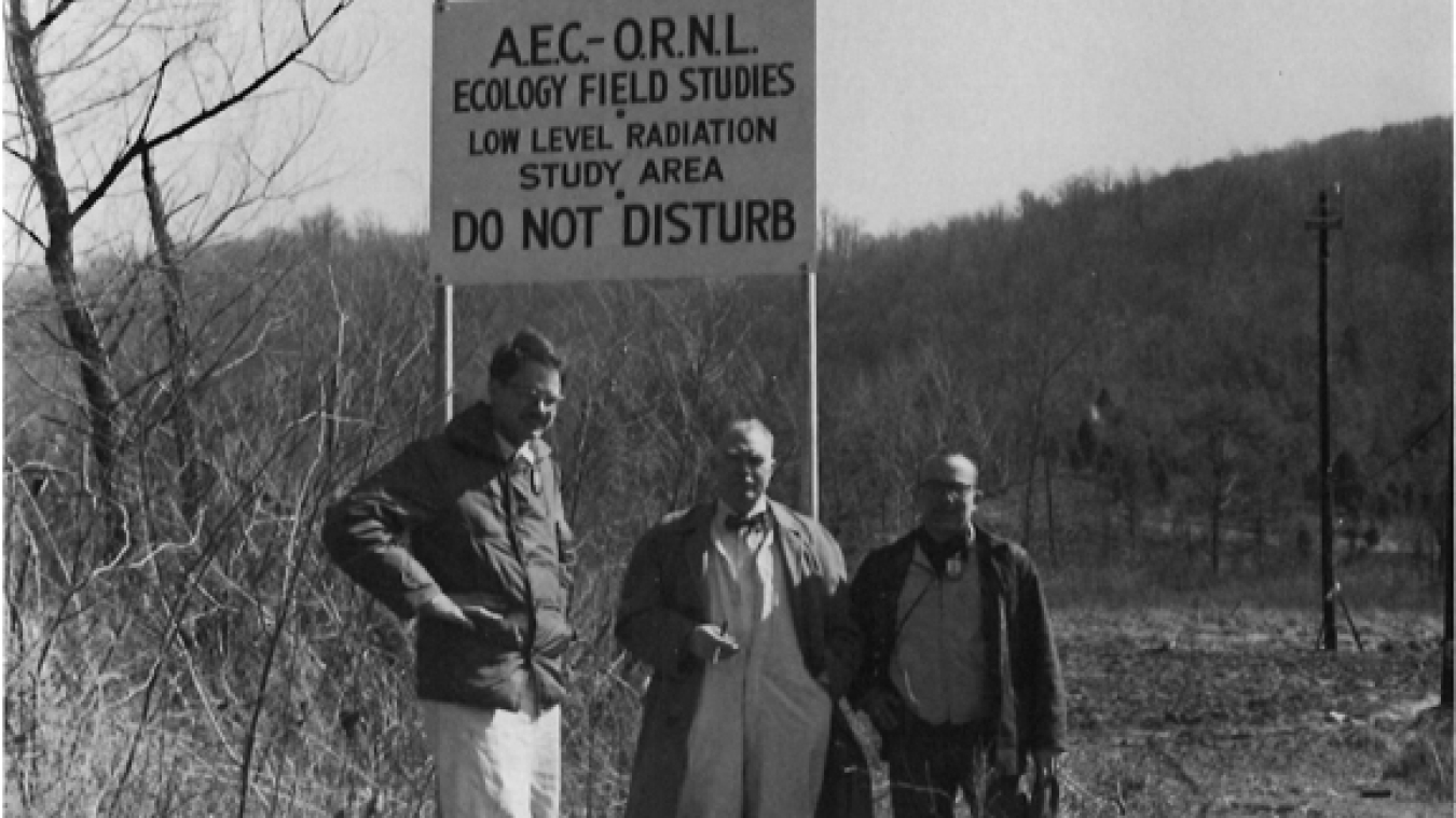 Jerry Olson and Stanley Auerbach of Oak Ridge National Laboratory show Orlando Park, a biology professor at Northwestern University, the agricultural plot on upper White Oak Lake Bed.