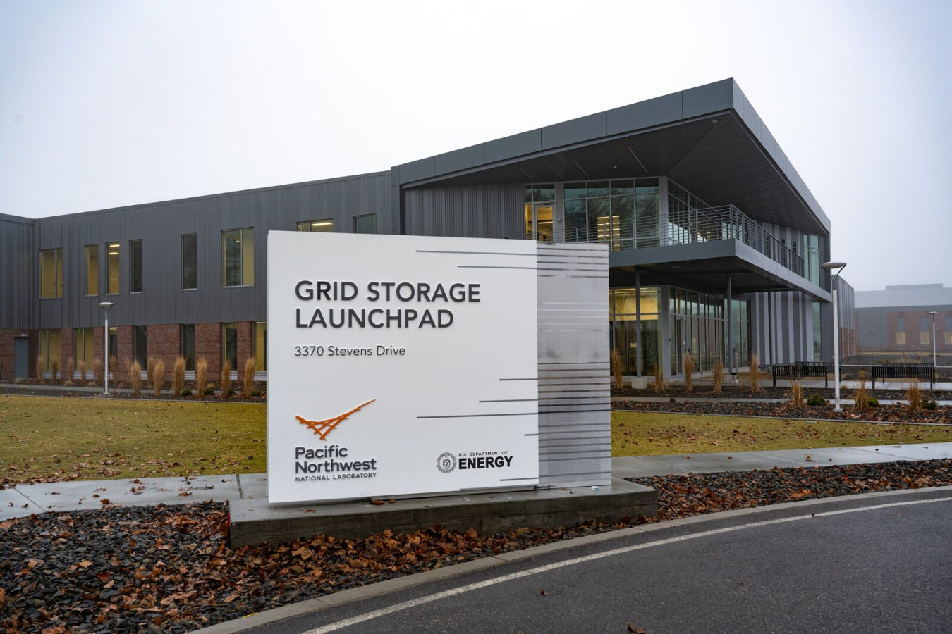 Outside exterior shot of Grid Storage Launchpad research facility with sign in the foreground. 